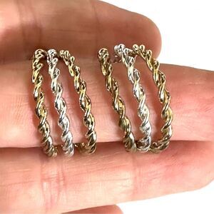 NWH silver and gold tone clip on earrings